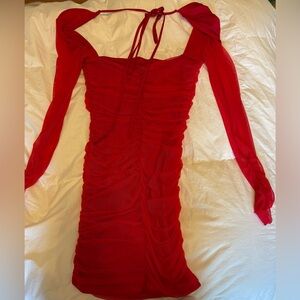 Lucy in the Sky Red Mini Bodycon Dress with Long Sleeves and Ruched Tie Front